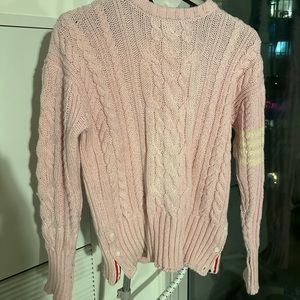 pink sweater from luxury Brand thom browne